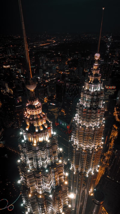 An aerial view city buildings at night
